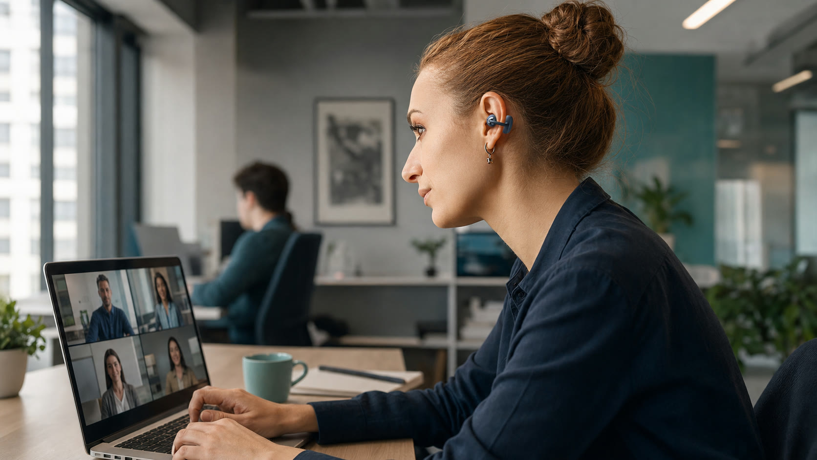 Office professional wearing the vivolight clip-on earphone concept during a video meeting.